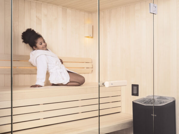 Harmony sauna room with control panel and heater
